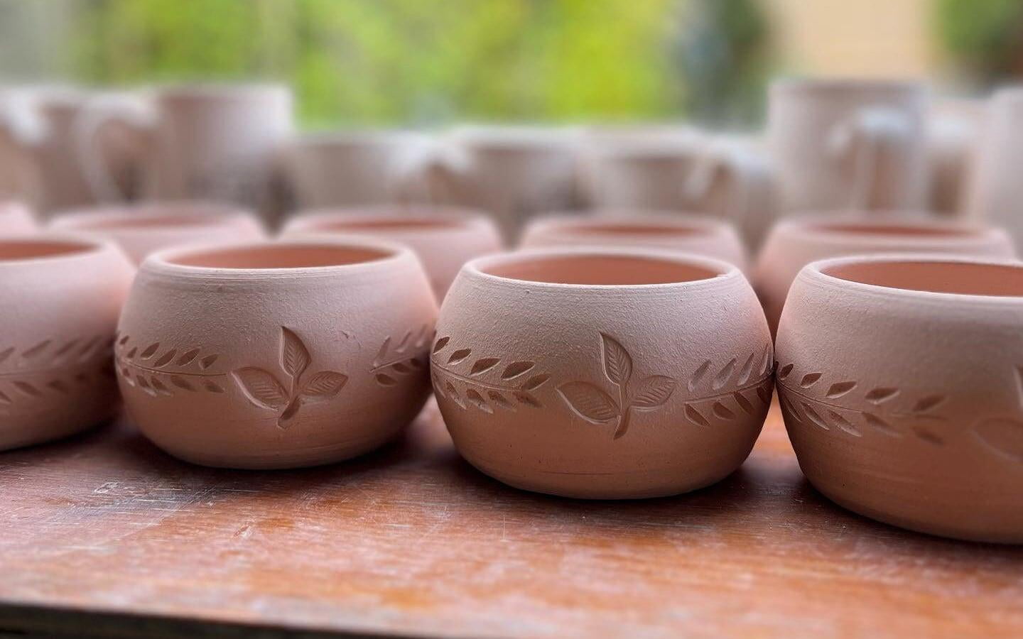 wholesale order for our circular vase with hand-stamped design 