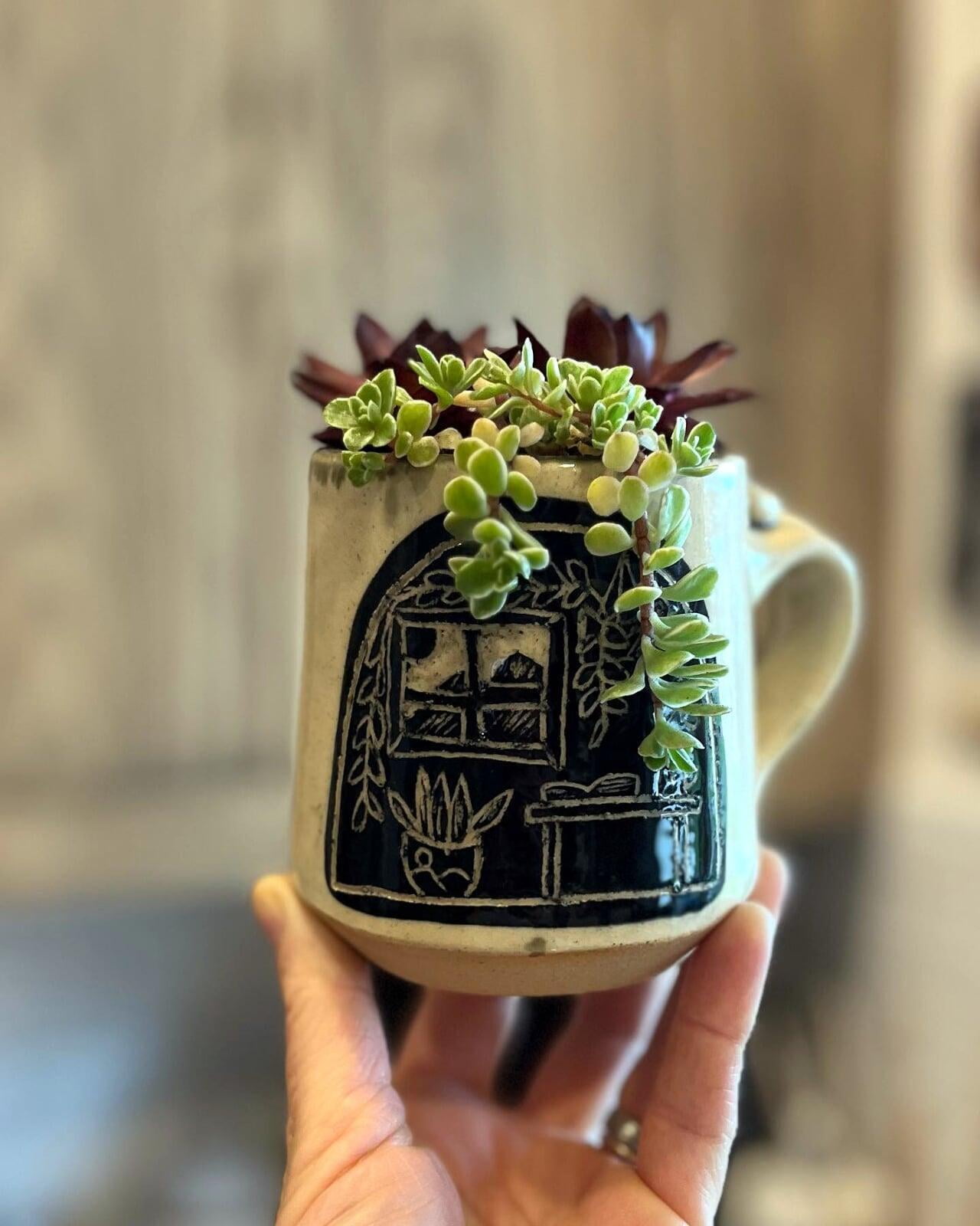 Mountain Pottery Mug with succulents 